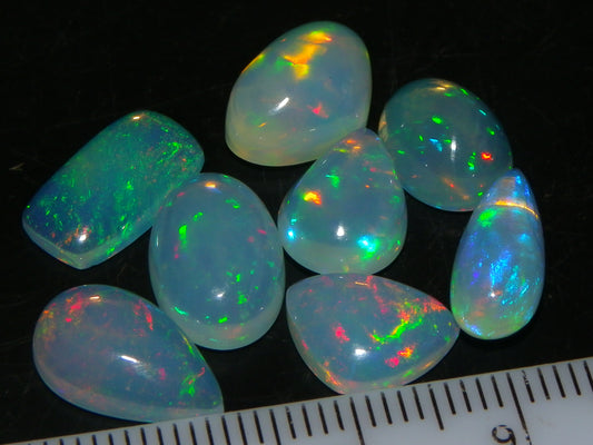 8 Nice Welo Crystal Opals / Cabs 17.2cts Multicolour Fires Ethiopia :)