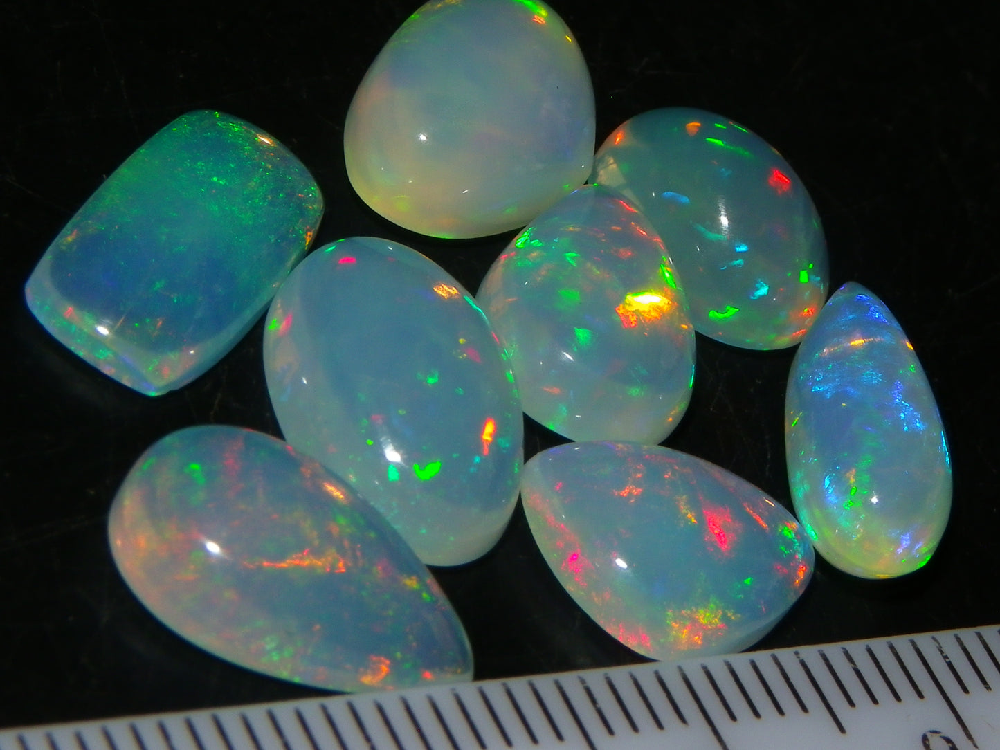 8 Nice Welo Crystal Opals / Cabs 17.2cts Multicolour Fires Ethiopia :)