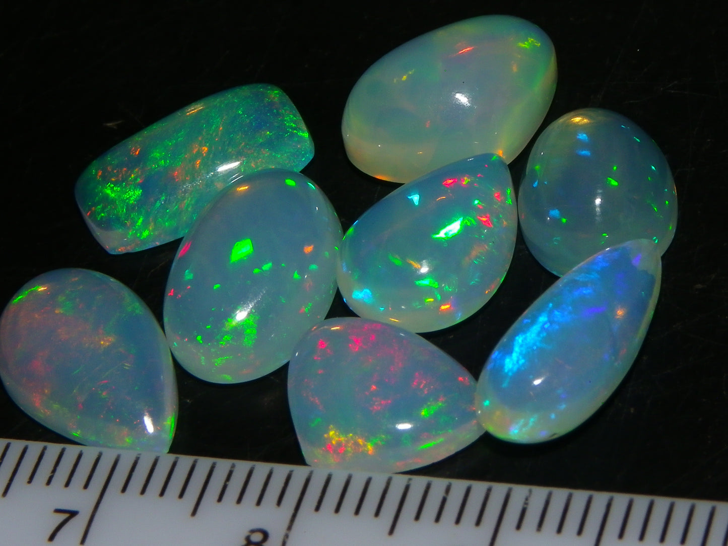 8 Nice Welo Crystal Opals / Cabs 17.2cts Multicolour Fires Ethiopia :)