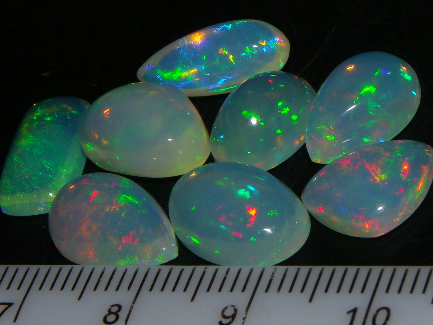 8 Nice Welo Crystal Opals / Cabs 17.2cts Multicolour Fires Ethiopia :)