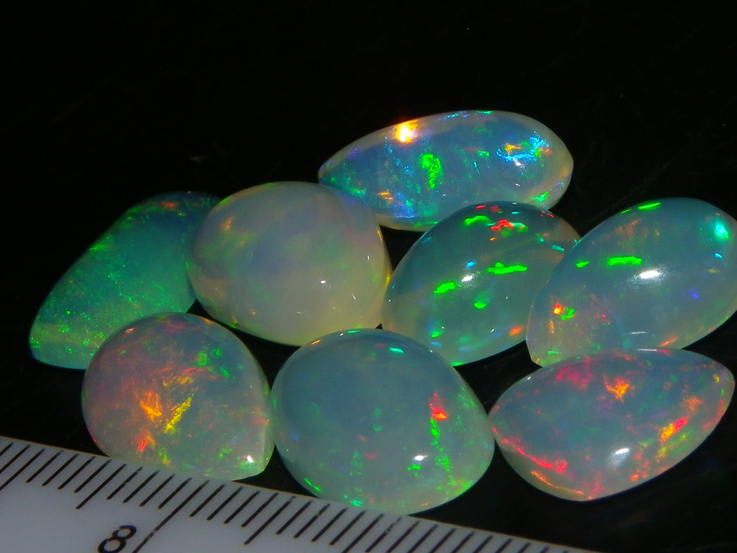 8 Nice Welo Crystal Opals / Cabs 17.2cts Multicolour Fires Ethiopia :)