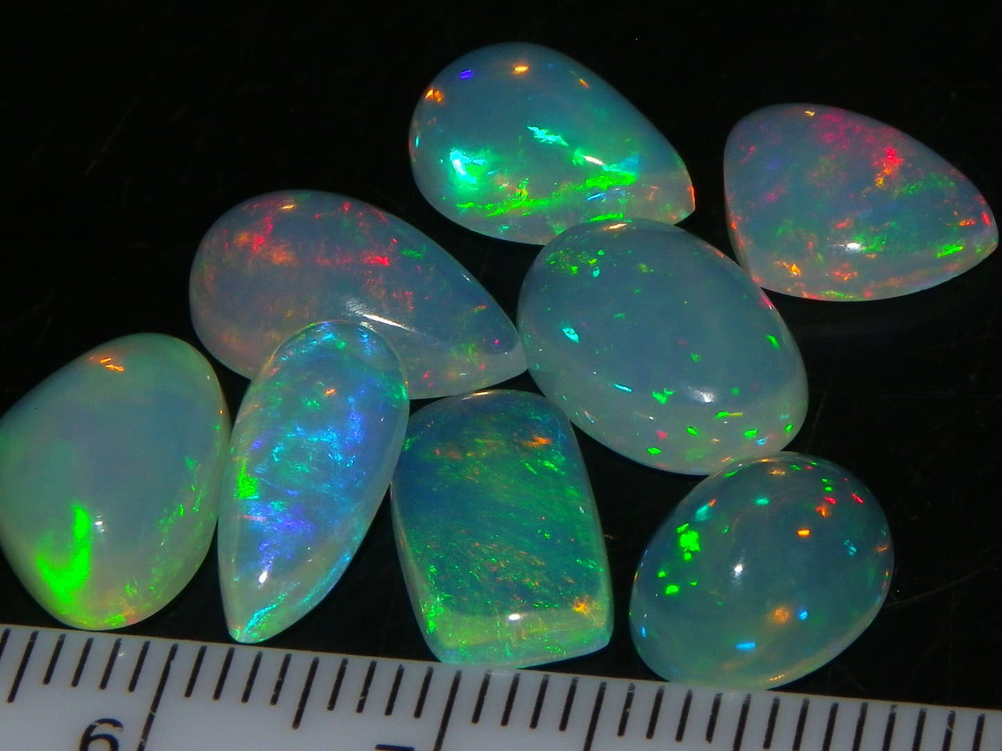 8 Nice Welo Crystal Opals / Cabs 17.2cts Multicolour Fires Ethiopia :)