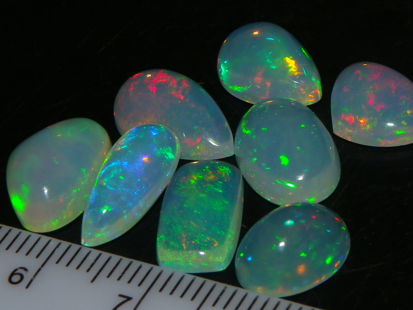 8 Nice Welo Crystal Opals / Cabs 17.2cts Multicolour Fires Ethiopia :)