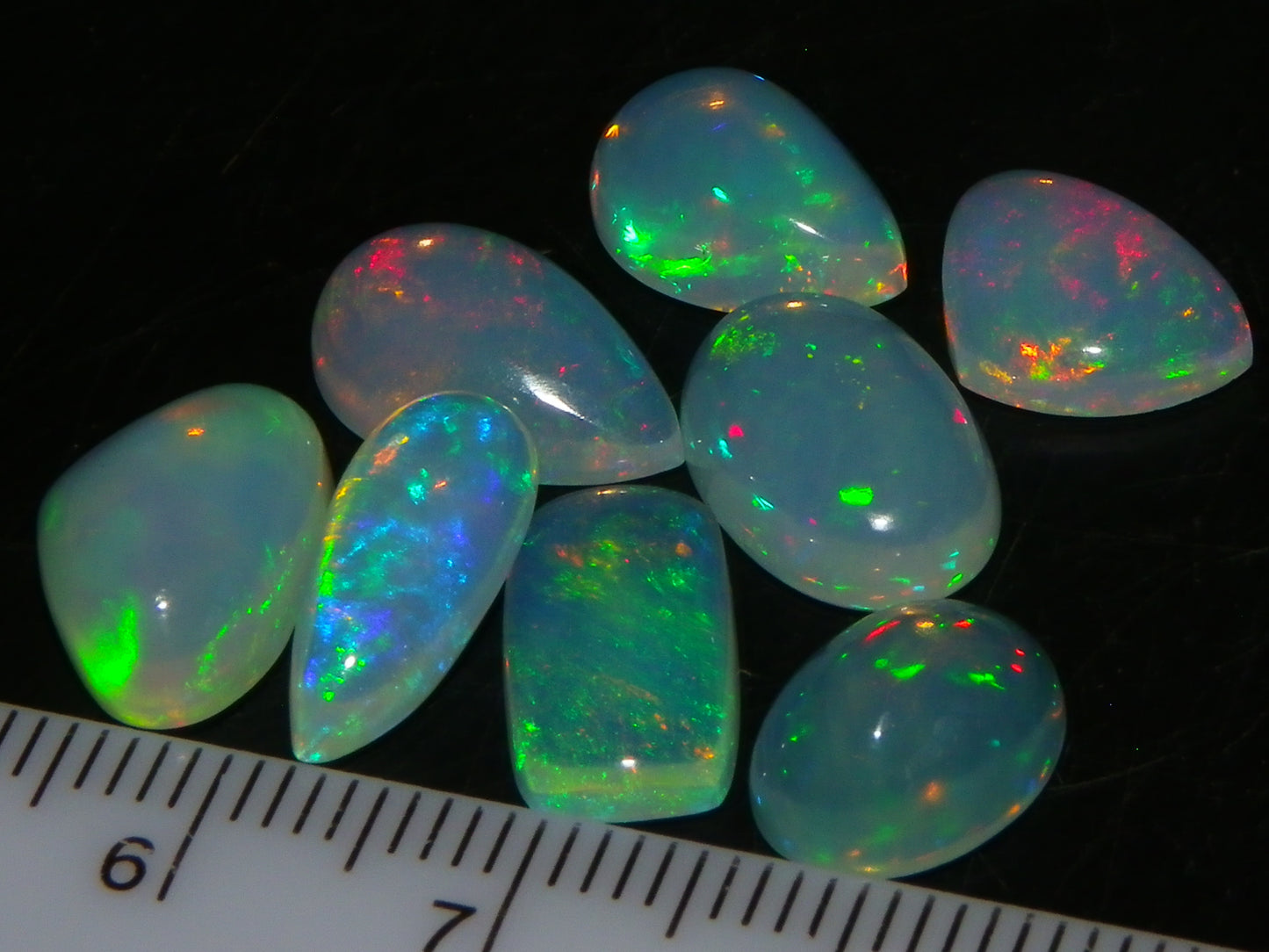 8 Nice Welo Crystal Opals / Cabs 17.2cts Multicolour Fires Ethiopia :)