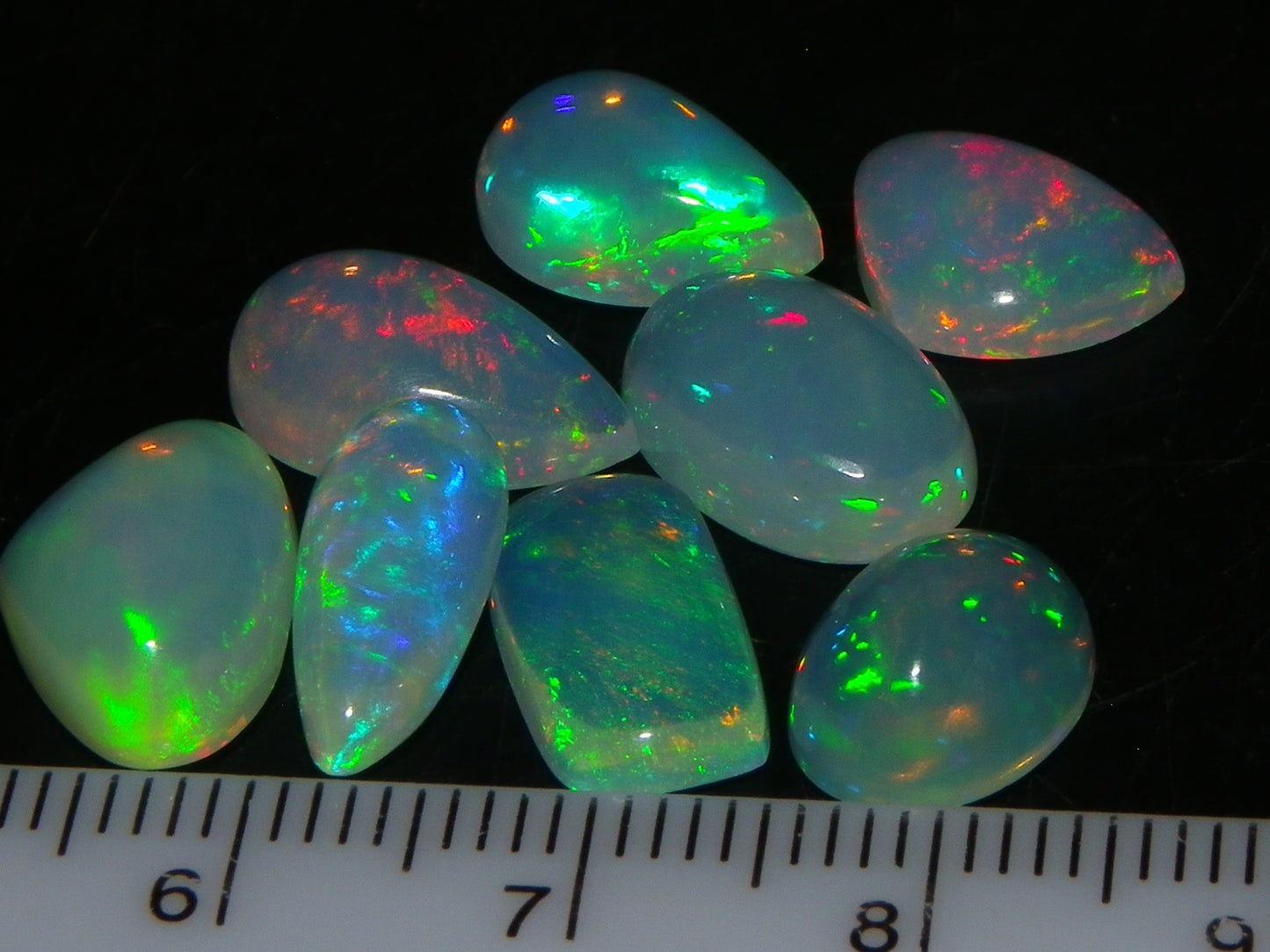 8 Nice Welo Crystal Opals / Cabs 17.2cts Multicolour Fires Ethiopia :)