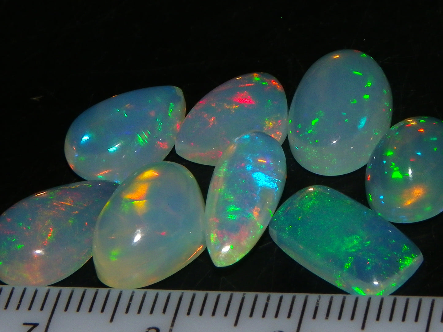 8 Nice Welo Crystal Opals / Cabs 17.2cts Multicolour Fires Ethiopia :)