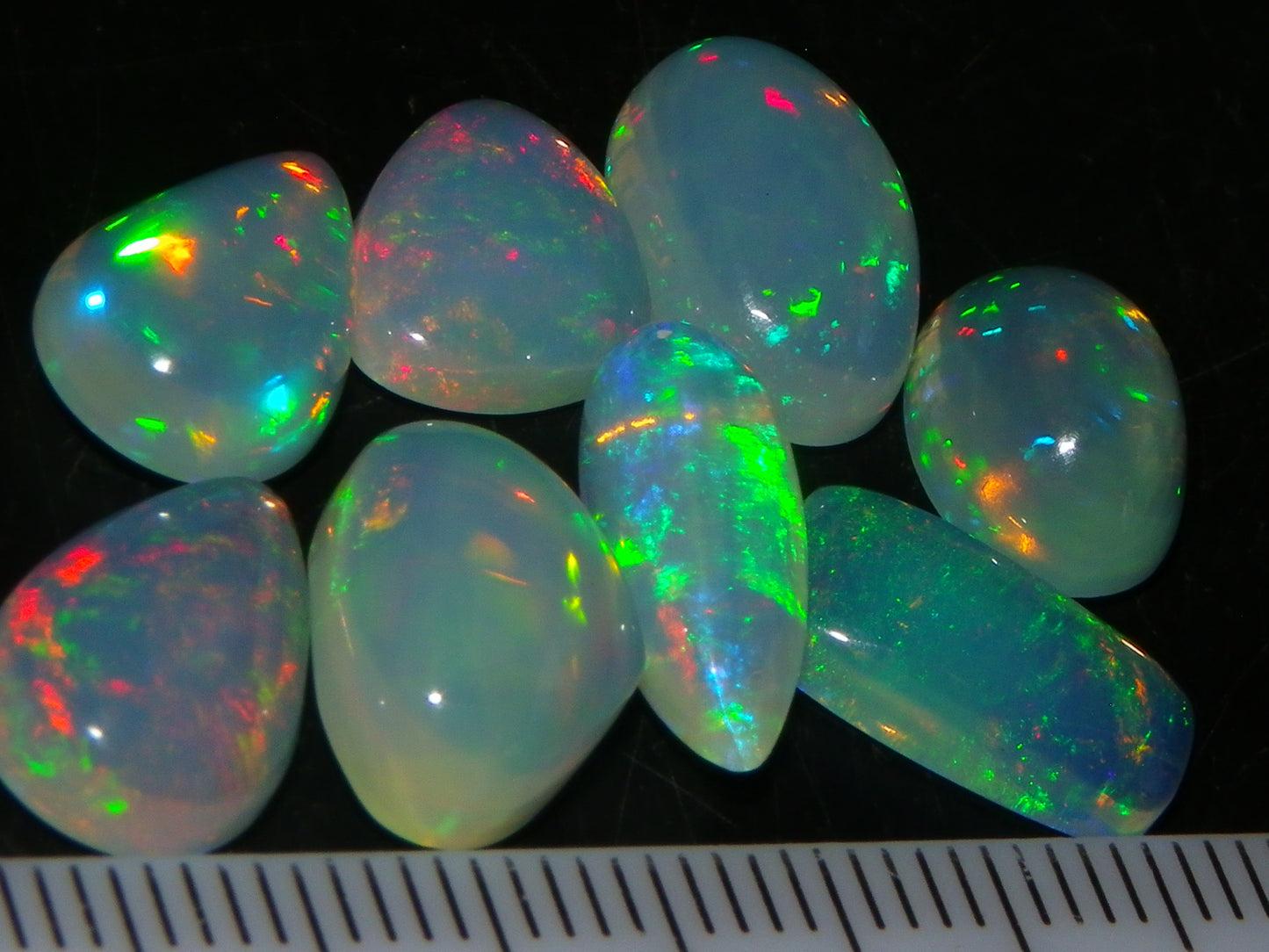 8 Nice Welo Crystal Opals / Cabs 17.2cts Multicolour Fires Ethiopia :)