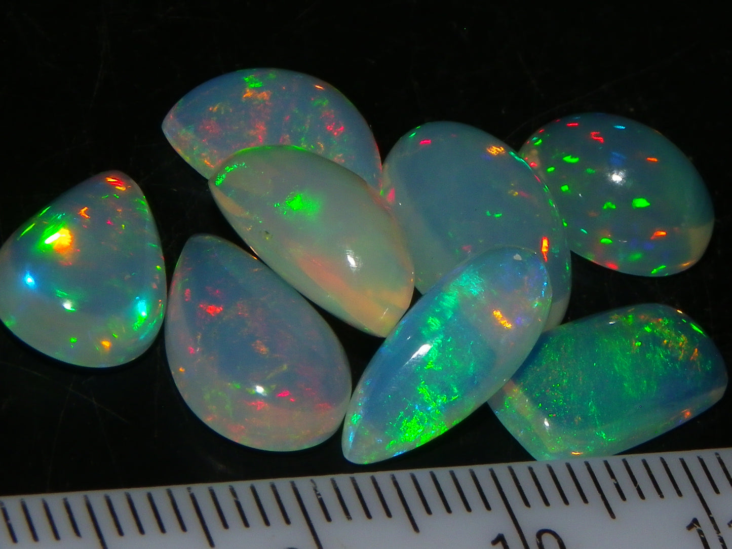 8 Nice Welo Crystal Opals / Cabs 17.2cts Multicolour Fires Ethiopia :)