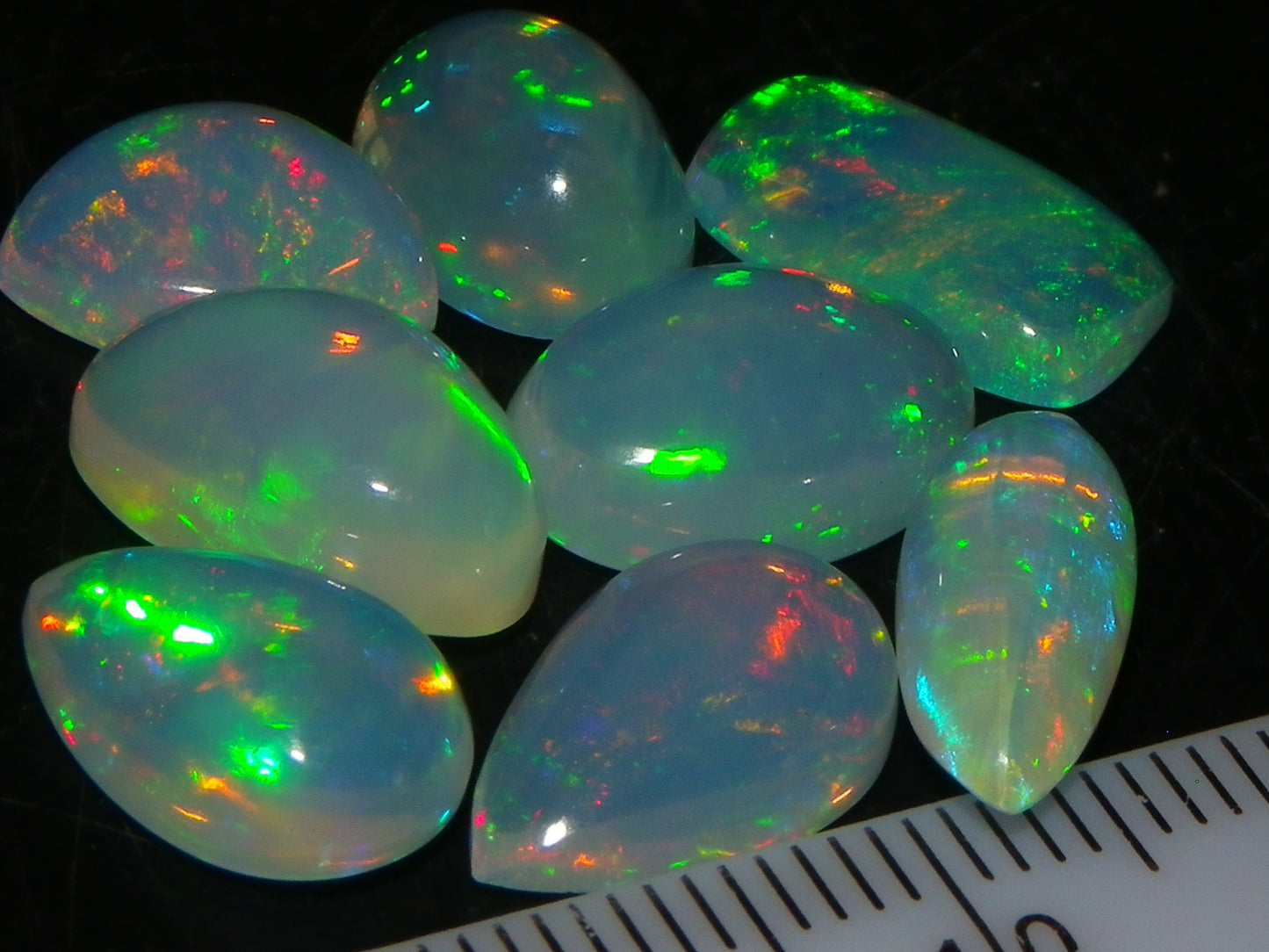 8 Nice Welo Crystal Opals / Cabs 17.2cts Multicolour Fires Ethiopia :)