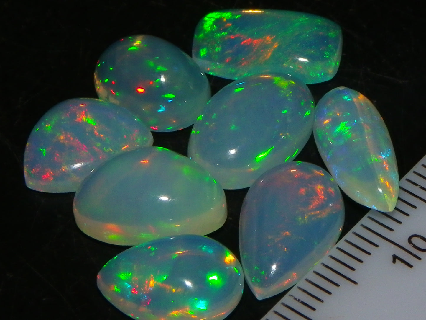 8 Nice Welo Crystal Opals / Cabs 17.2cts Multicolour Fires Ethiopia :)