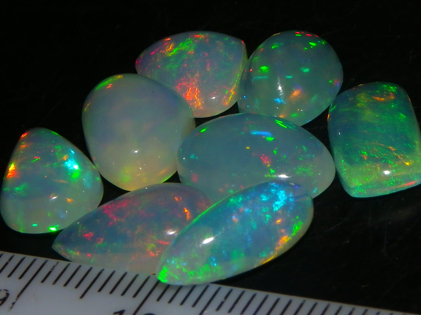 8 Nice Welo Crystal Opals / Cabs 17.2cts Multicolour Fires Ethiopia :)