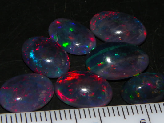 7 Nice Cut/Polished/Treated Welo Crystal Opal Cabs 15.45cts red/Green Fires Ethiopia