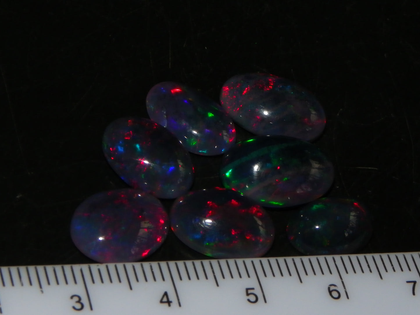 7 Nice Cut/Polished/Treated Welo Crystal Opal Cabs 15.45cts red/Green Fires Ethiopia