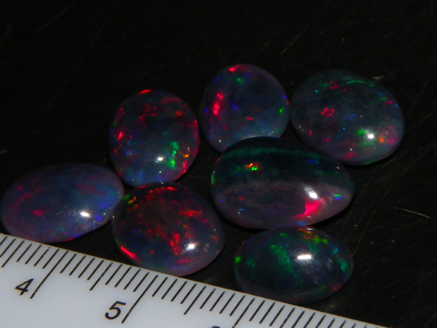 7 Nice Cut/Polished/Treated Welo Crystal Opal Cabs 15.45cts red/Green Fires Ethiopia