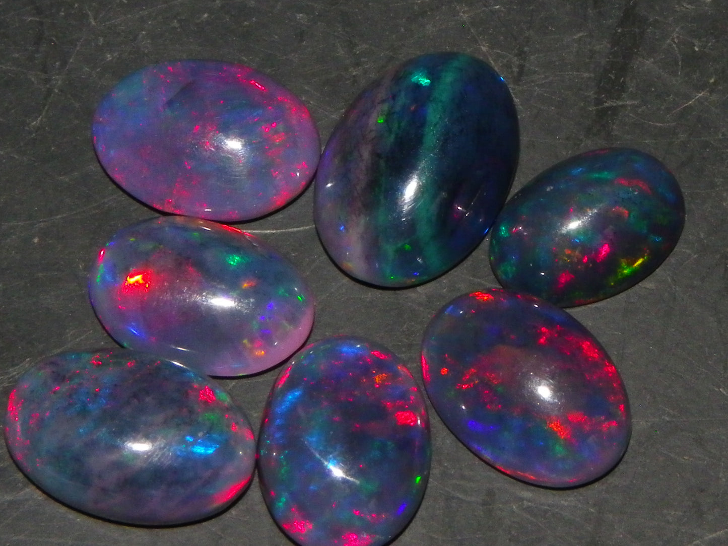 7 Nice Cut/Polished/Treated Welo Crystal Opal Cabs 15.45cts red/Green Fires Ethiopia