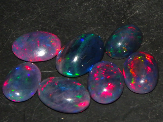 7 Nice Cut/Polished/Treated Welo Crystal Opal Cabs 15.45cts red/Green Fires Ethiopia