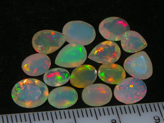 Nice Parcel Faceted/Cut Welo Opals 9cts 15 stones Multicolour Fires Mixed shapes