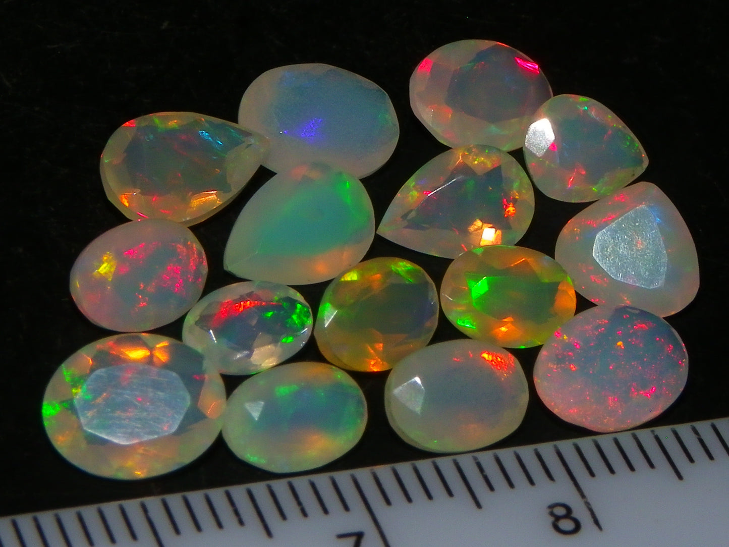 Nice Parcel Faceted/Cut Welo Opals 9cts 15 stones Multicolour Fires Mixed shapes