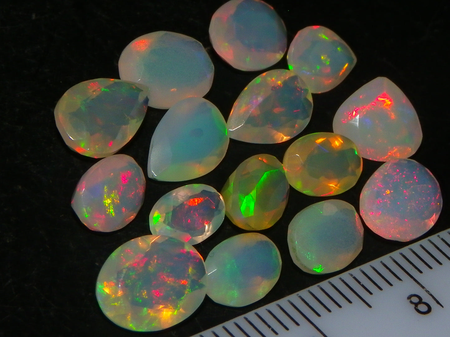 Nice Parcel Faceted/Cut Welo Opals 9cts 15 stones Multicolour Fires Mixed shapes