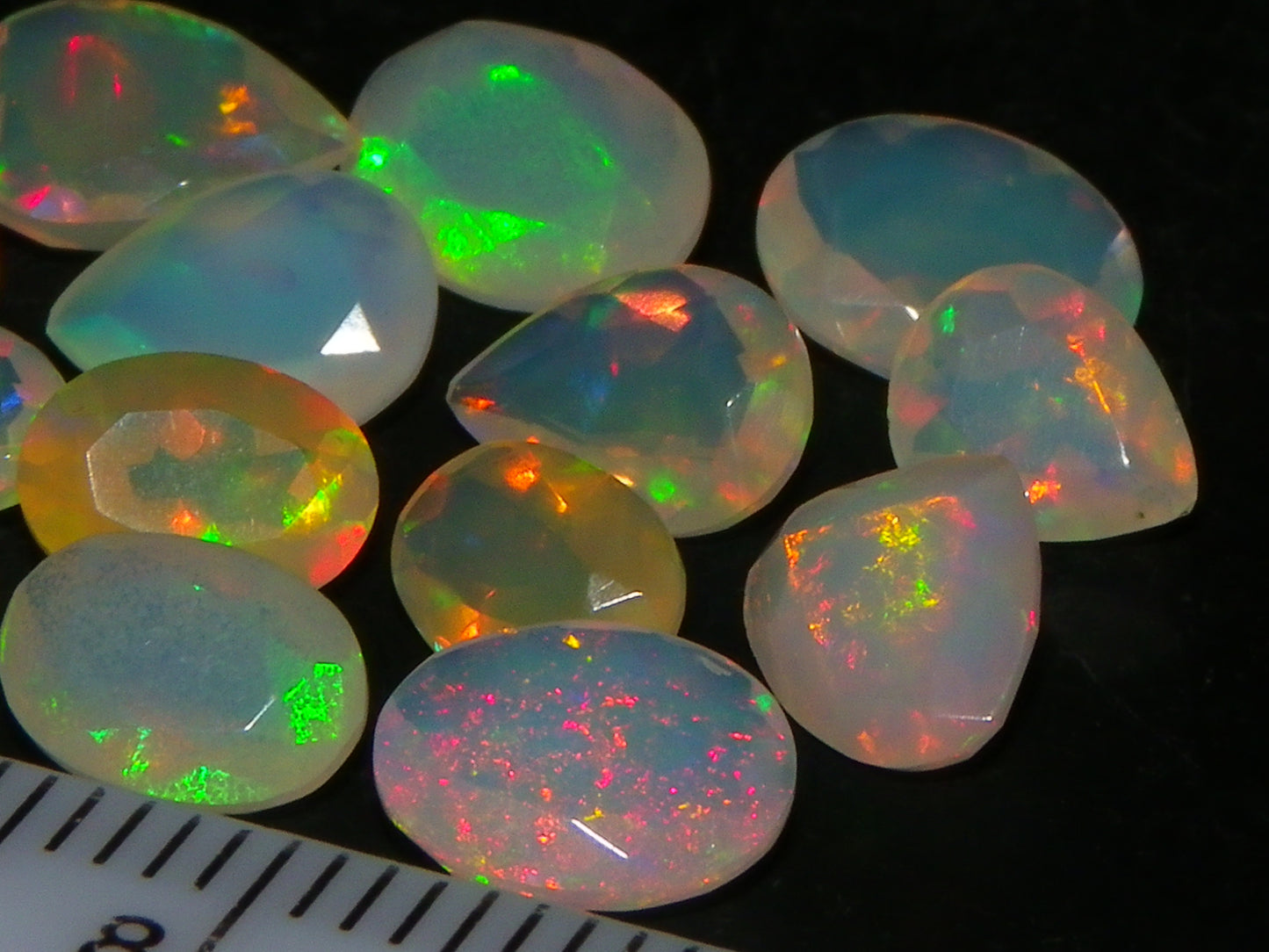 Nice Parcel Faceted/Cut Welo Opals 9cts 15 stones Multicolour Fires Mixed shapes