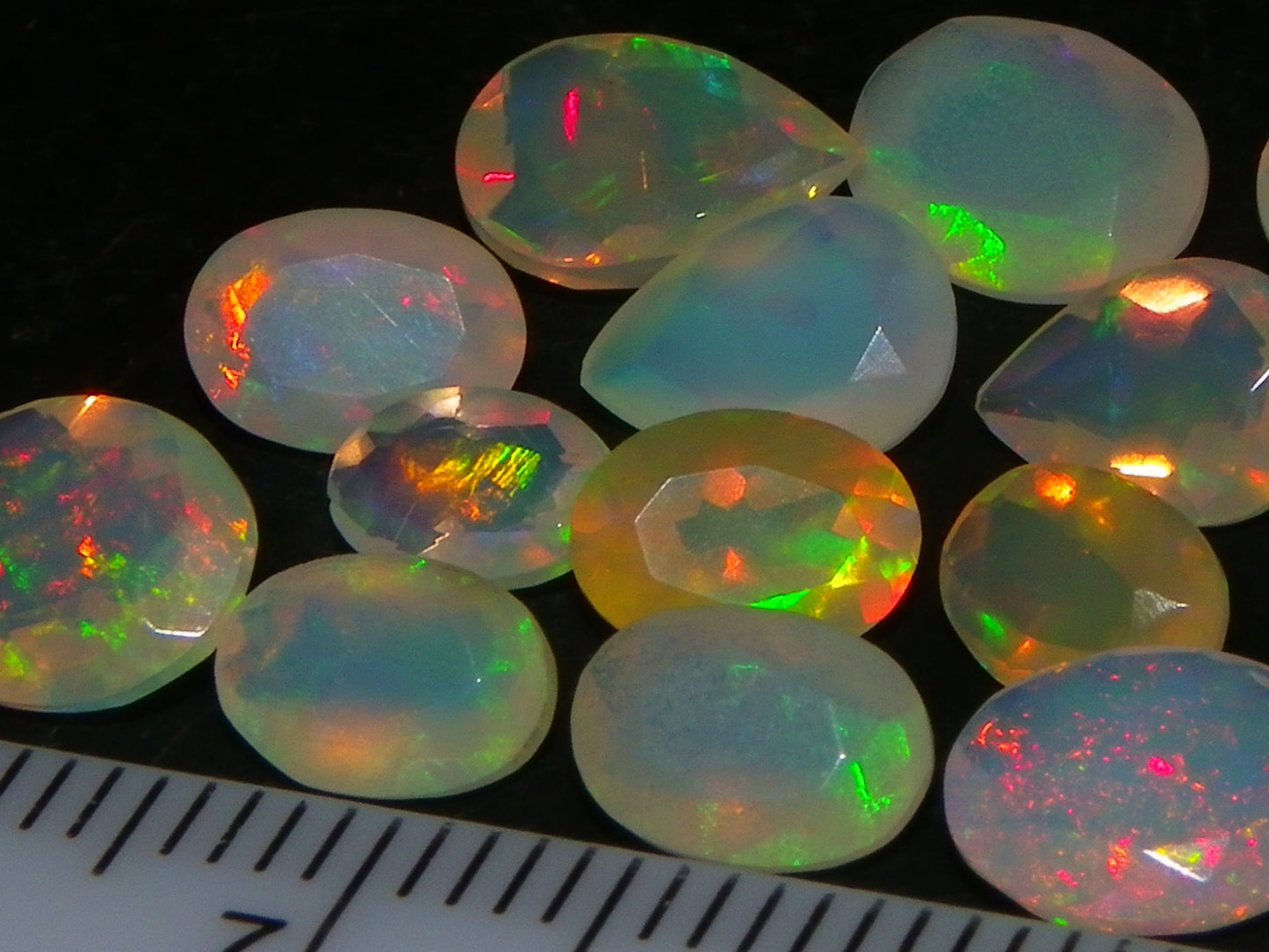 Nice Parcel Faceted/Cut Welo Opals 9cts 15 stones Multicolour Fires Mixed shapes