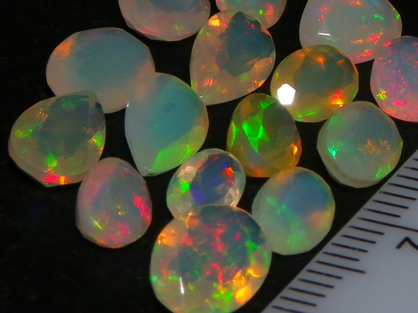 Nice Parcel Faceted/Cut Welo Opals 9cts 15 stones Multicolour Fires Mixed shapes