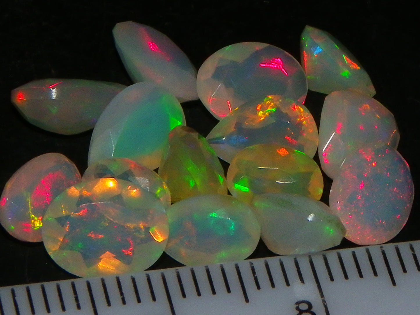 Nice Parcel Faceted/Cut Welo Opals 9cts 15 stones Multicolour Fires Mixed shapes