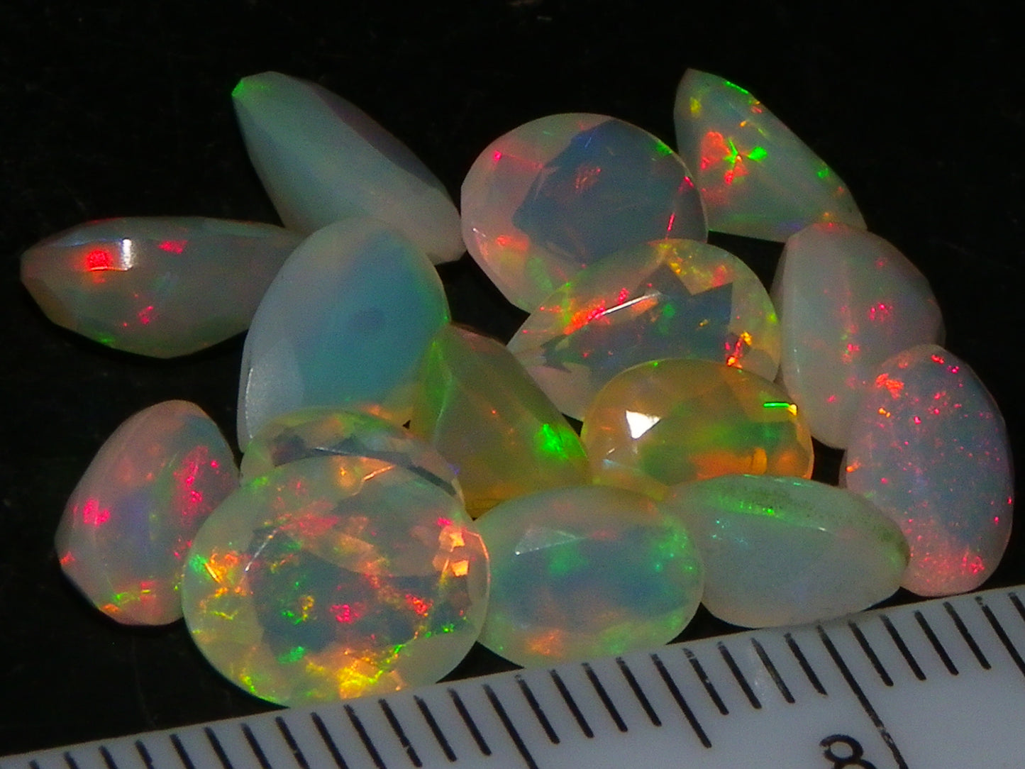 Nice Parcel Faceted/Cut Welo Opals 9cts 15 stones Multicolour Fires Mixed shapes