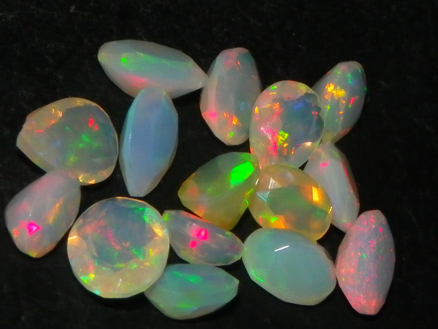 Nice Parcel Faceted/Cut Welo Opals 9cts 15 stones Multicolour Fires Mixed shapes