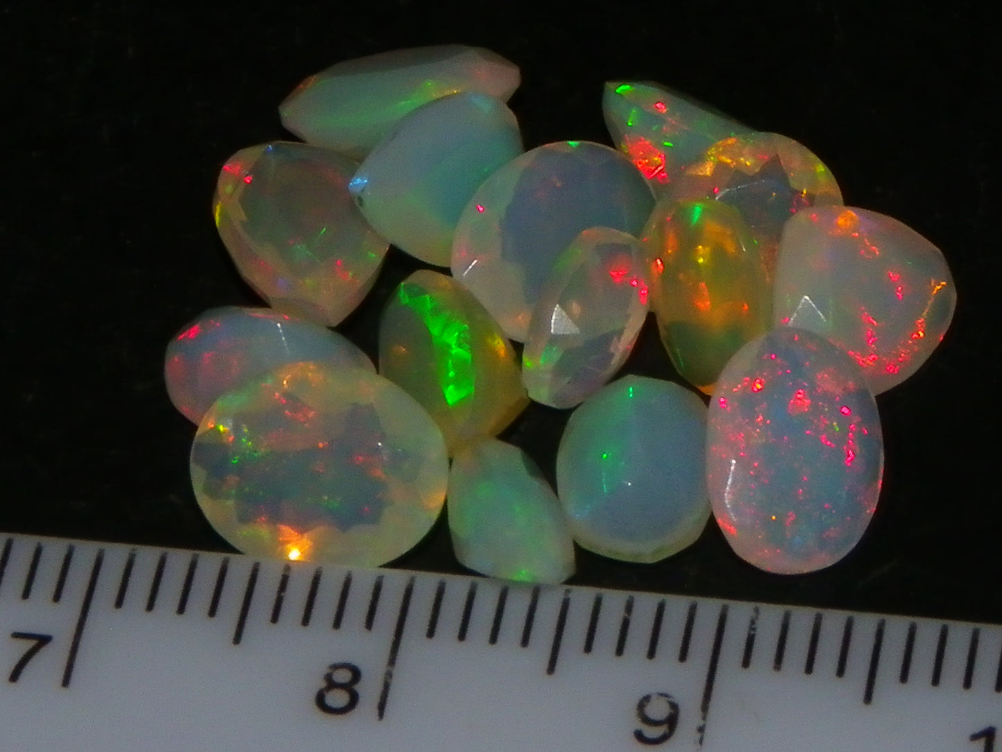 Nice Parcel Faceted/Cut Welo Opals 9cts 15 stones Multicolour Fires Mixed shapes