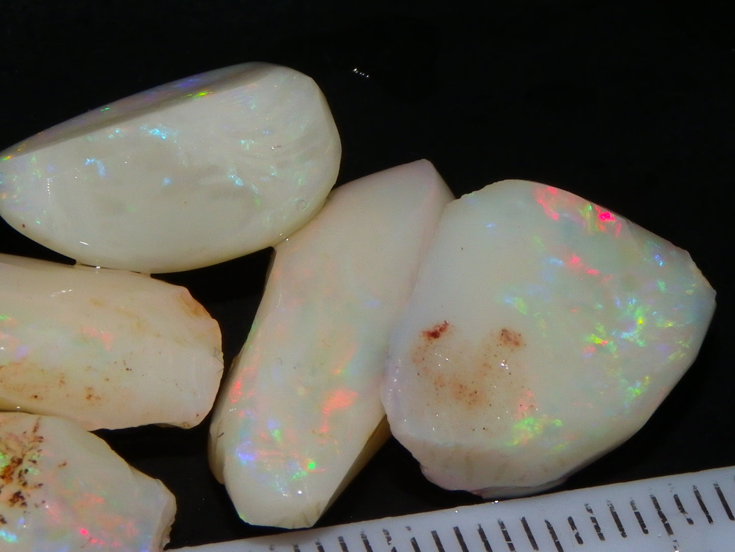 5 Nice Coober Pedy Rough/Rubbed Opals 31.65cts Red/Green/Blue Fires Australia