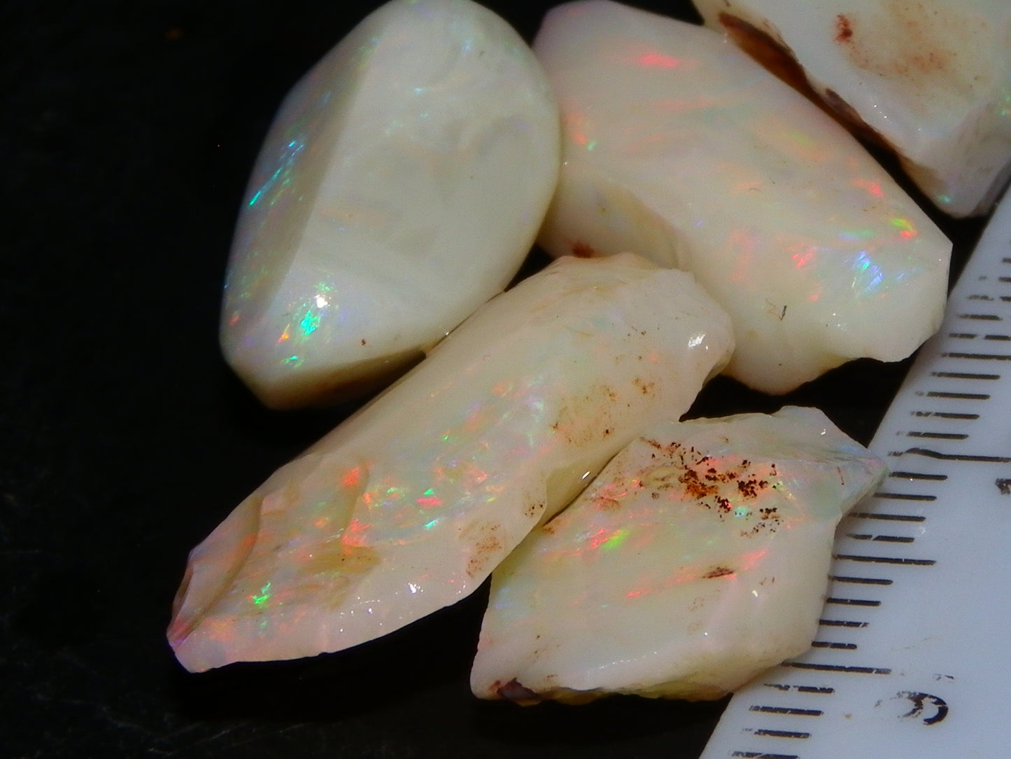 5 Nice Coober Pedy Rough/Rubbed Opals 31.65cts Red/Green/Blue Fires Australia