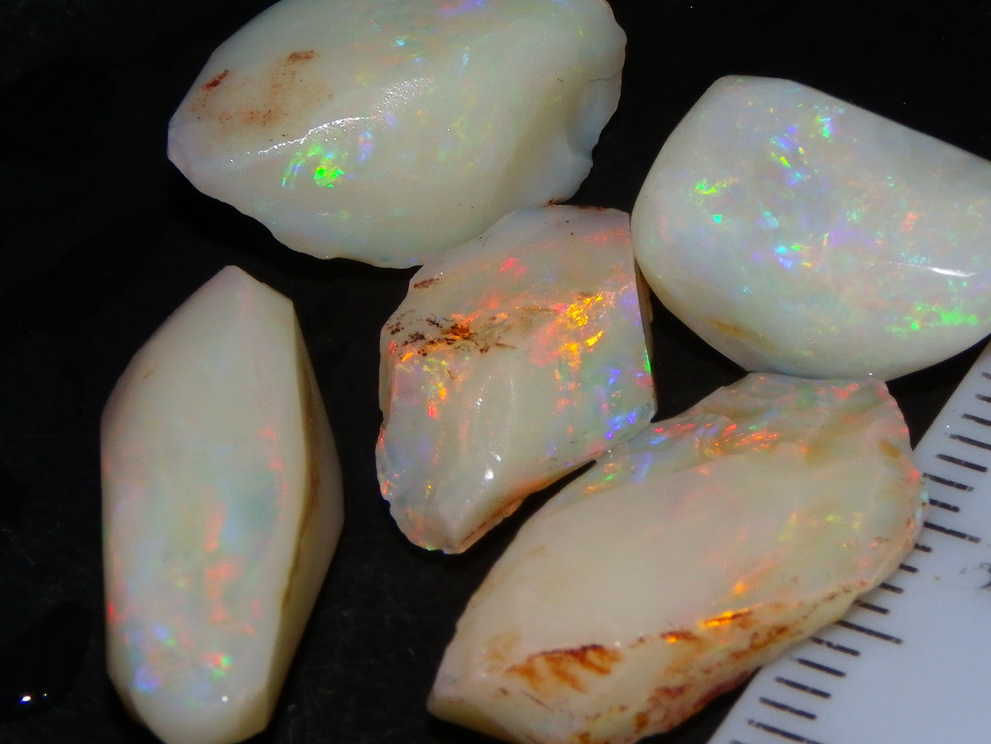 5 Nice Coober Pedy Rough/Rubbed Opals 31.65cts Red/Green/Blue Fires Australia